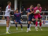 Jack Sampson is beaten to the ball against Hereford (photo: David Airey/dia_images)