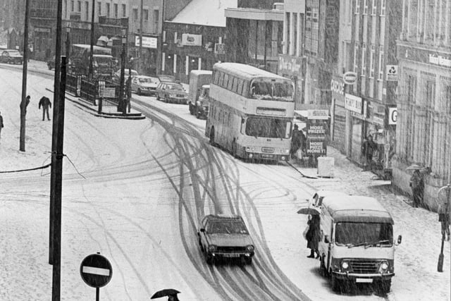 It is unusual to see Fishergate like this - in the midst of a snowstorm. In the background you can just make out the underground toilets island in the centre of the road