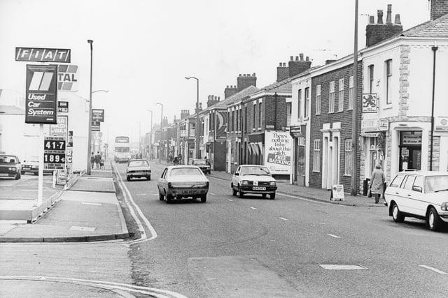 This picture just about shows the garage on Ribbleton Lane and was taken from the corner of Longworth Street, Preston. Judging by the cars it was taken in the early 80