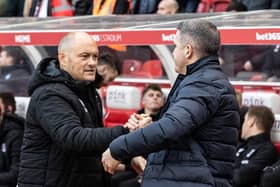 Preston North End's manager Ryan Lowe is greeted by Stoke City's manager Alex Neil