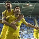 Preston North End's Ched Evans (right) celebrates scoring his side's first goal