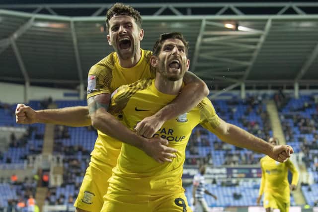 Preston North End's Ched Evans (right) celebrates scoring his side's first goal