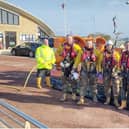 Morecambe RNLI crews with the hovercraft after the rescue from quicksand near Silverdale. Picture from RNLI.