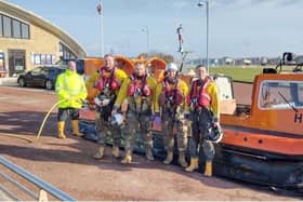 Morecambe RNLI crews with the hovercraft after the rescue from quicksand near Silverdale. Picture from RNLI.