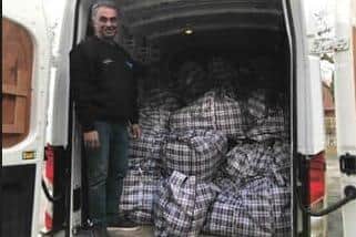 Volunteer Sal Malek with vital supplies to be delivered across the Ukraine border.