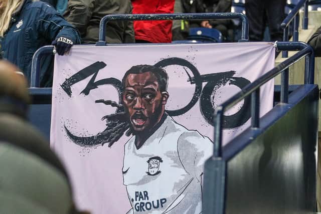 A banner of Preston North End's Daniel Johnson hangs in the Alan Kelly Town End