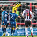 Harry Burgoyne made a couple of fine saves in Morecambe's loss at Gillingham Picture: Morecambe FC
