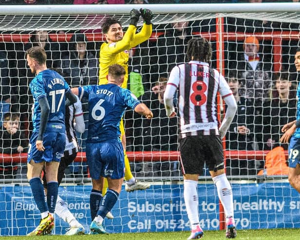 Harry Burgoyne made a couple of fine saves in Morecambe's loss at Gillingham Picture: Morecambe FC