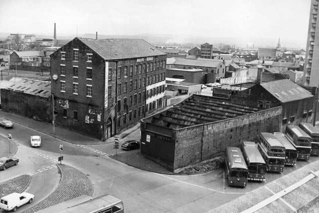 A view of Booth's foundry and Boast's furniture repository from the top of Preston bus station taken in the early 70s. John Booth's was an old-established Preston firm which made castings and steel fabrications for industry and public services. They rented the building from Dorman Smith's. Boast's was one of the town best-known firms of furniture removers. When the image was taken three adjoining sites in the run-down area off Church Street had been put on the property market as one to be turned into a major new development