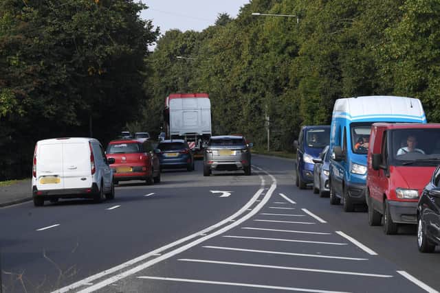Could the single carriageway stretch of the A582 cope with the traffic from 1,100 new homes - or would it need widening?