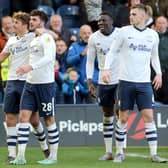 Preston North End's Tom Cannon (2nd left) celebrates with teammates after scoring his side's second goal