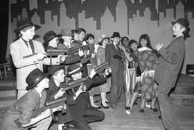 Fat Sam's gang finally caught up with the slickest schoolboy in town, Bugsy Malone. But the "gunning down" of Bugsy was just part of the fun as youngsters at St Thomas More High School, Fulwood, look forward to their fothcoming play
