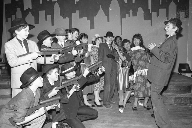 Fat Sam's gang finally caught up with the slickest schoolboy in town, Bugsy Malone. But the "gunning down" of Bugsy was just part of the fun as youngsters at St Thomas More High School, Fulwood, look forward to their fothcoming play