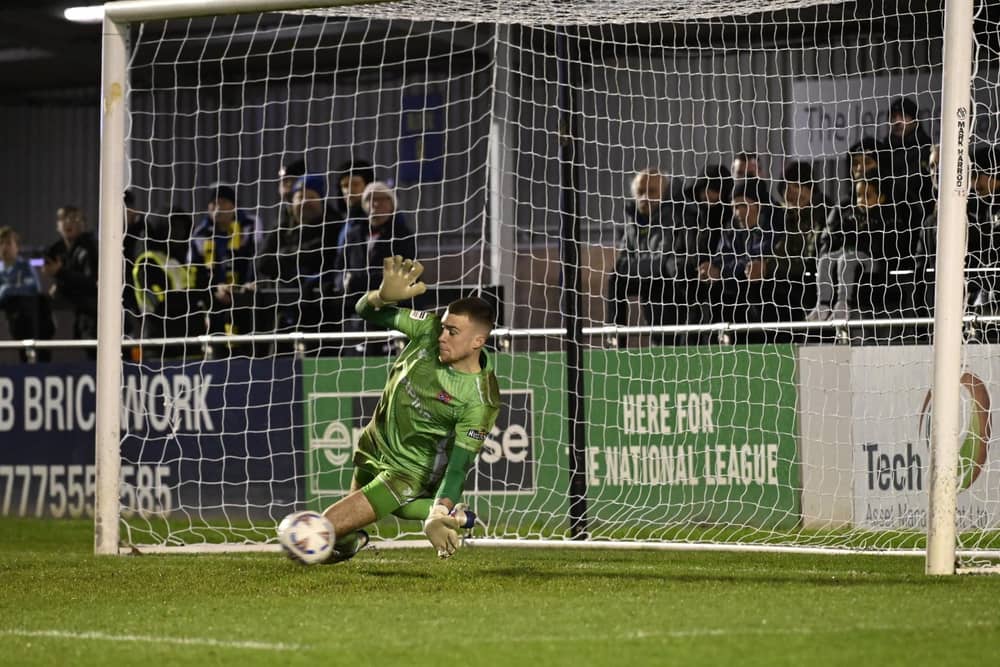 Pat Boyes makes a crucial save in the penalty shootout (photo: Steve Mclellan/AFC Fylde)