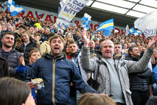 Preston North End fans enjoy the pre-match atmosphere at Deepdale