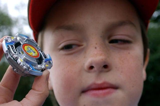 Back in 2003, here's Philip Reid, nine, from Clayton-le-Woods with his Bey-blade at the Championship at Toys R Us, Preston