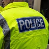 Two people were arrested after police found a sawn-off shotgun in a car on the M6
