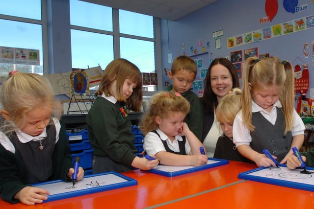Kathryn Pym with members of the reception class at Barton St Lawrence Primary