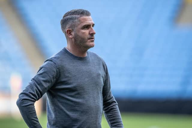 Preston North End manager Ryan Lowe looks on at Coventry City.