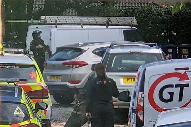 Armed police at the scene in Cranfield View, Darwen on Monday morning (September 19)