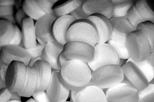 Criminals have been selling white tablets as a homeopathic vaccine alternative, according to Lancashire Police.