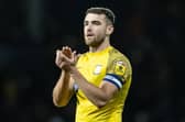 Preston North End's Ben Whiteman applauds his side's travelling supporters