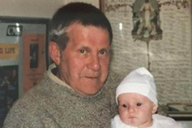 Preston pensioner Frank Fishwick with one of his grandchildren