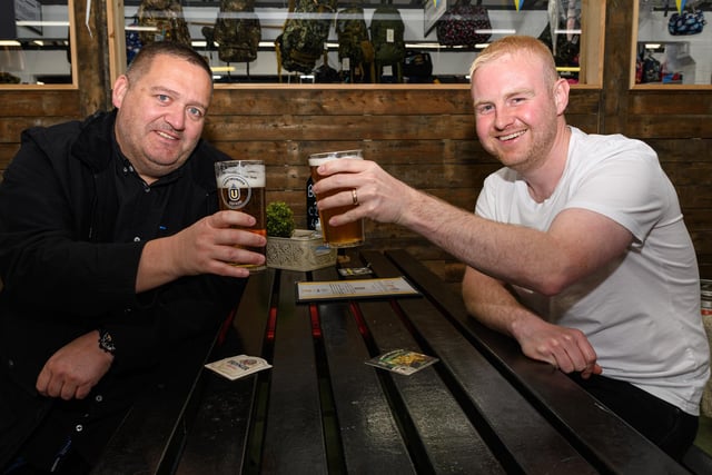 Gary Pownall and Joe Scott enjoying a pint at the Bob Inn nestled in Chorley Markets