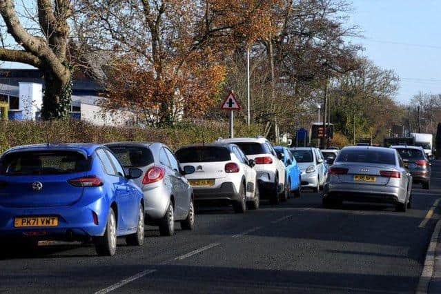 Cars are forced to park on the road and on side streets surrounding the school