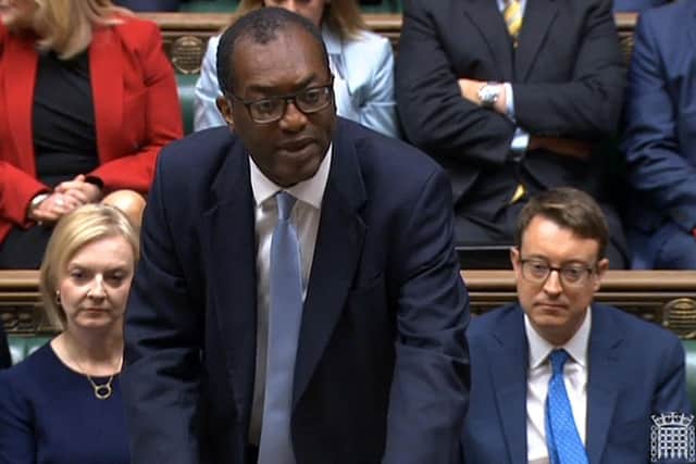 TOPSHOT - A video grab taken from footage broadcast by the UK Parliament's Parliamentary Recording Unit (PRU) shows Britain's Chancellor of the Exchequer Kwasi Kwarteng unveiling an anti-inflation budget plan at the House of Commons in London on September 23, 2022.