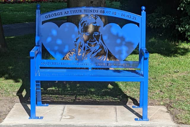 George Hinds memorial bench was unveiled in Happy Mount Park by TT legend John McGuinness. The bench depicts George's smiling face and reads: "Snatched from our lives but not from our hearts".