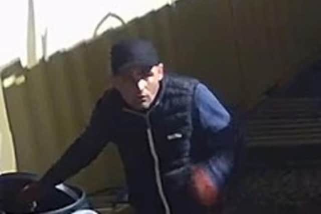 Officers want to this man following a burglary at the United Utilities Water Treatment Works in Irwell Vale (Credit: Lancashire Police)
