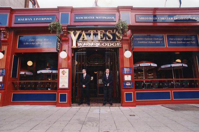 Bouncers on duty outside Yates's Wine Lodge in 1995