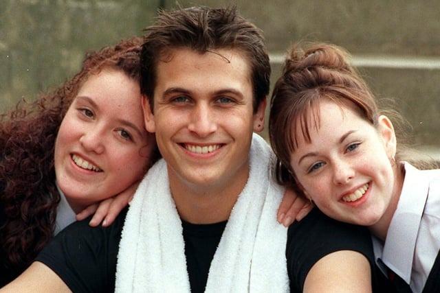 Our hero.... Students Amber Abdellah and Karen Heywood meet Another Level singer Christian Fry at Tulketh High School in Ingol, Preston back in 1998