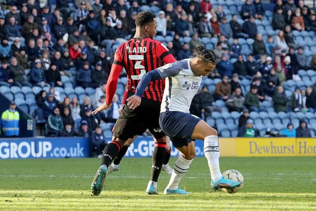 Preston North End's Cameron Archer shields the ball from Bournemouth's Ethan Laird