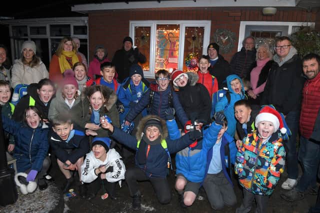 Photo Neil Cross; New Longton turns into advent calendar as 24 houses are lighting up a window with a theme throughout December.