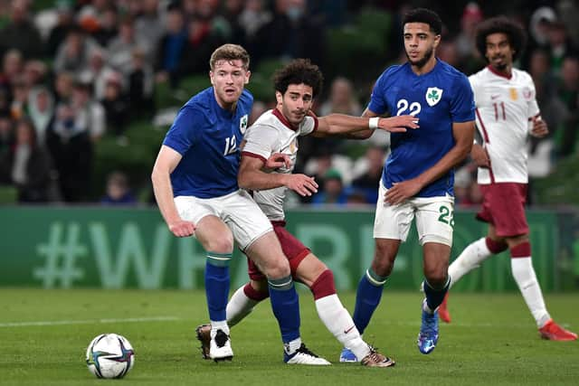 Nathan Collins of Republic of Ireland battles for possession with Ahmed Alaaeldin of Qatar during the International Friendly match between Republic of Ireland and Qatar. Typhoons built in Lancashire will provide air security during this winter's World Cup in Qatar