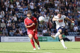 Jordan Thompson fires a shot