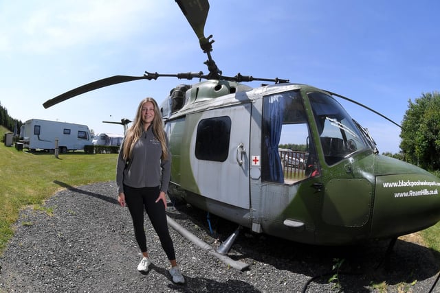 Katie Lewin at Ream Hills Holiday Park and the helicopter - one of the most unusual places to sleep in Lancashire