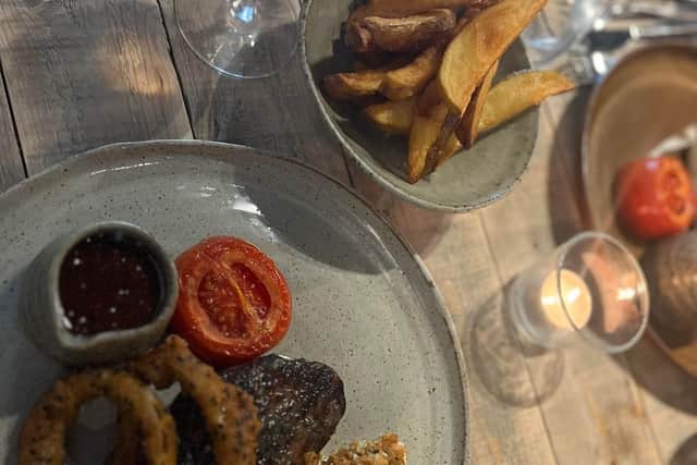The main course was 8oz fillet steak, served with confit tomatoes, pickled onion rings, cos lettuce, chunky chips and green pepper, and black peppercorn sauce. (£35.00).