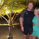 All smiles for newlyweds Shayne and Jade Singleton pictured on their honeymoon in the Maldives. The couple panicked when they arrived at Manchester Airport with their two sons' passports instead of their own but a friend, Aftab Afzal, stepped in to make a rush delivery of the right ones so they could make their flight
