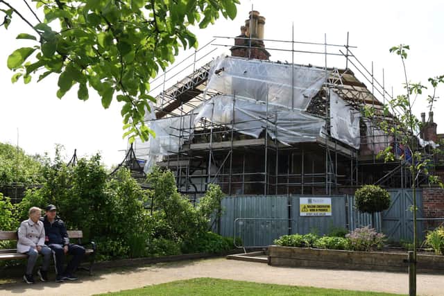 ... but the cottage area at the back of the building is still shrouded in scaffolding