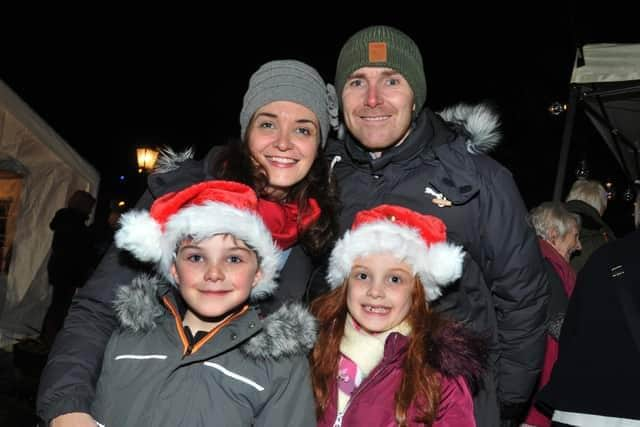 Longirgde does Christmas 2018: Julie and Graham Mitton with twins Thomas and Eva, eight, have fun at the Longridge Does Christmas event, at Longridge Station.