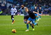 North End's Ali McCann holds off the challenge from Sheffield Wednesday's Nathaniel Chalobah