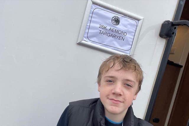 Leo Ashton, 14,  and from Chorley, stars as young Aemond Targaryan in HBO's House of the Dragon. Pictured outside his trailer on set