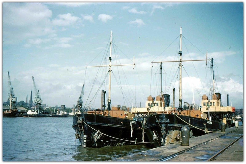 Back in 1960, dredgers Calder and Savick were tied up alongside the south side of the main basin at Preston Dock.Picture courtesy of Preston Digital Archive.