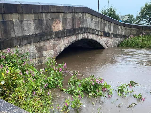 The River Yarrow was close to breaching on Sunday, even after Croston's flood defence system swung into action (image: Cllr Chris Worthington)