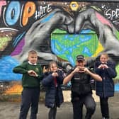 Some of the competition winners from Coppull who helped design the mural against hate crime to coincide with Hate Crime Awareness Week