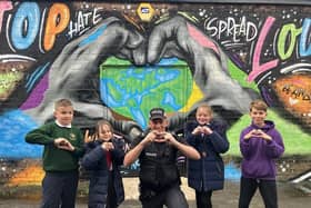 Some of the competition winners from Coppull who helped design the mural against hate crime to coincide with Hate Crime Awareness Week