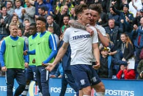 Preston North End's Josh Harrop celebrates scoring his side's first goal with teammate Sean Maguire